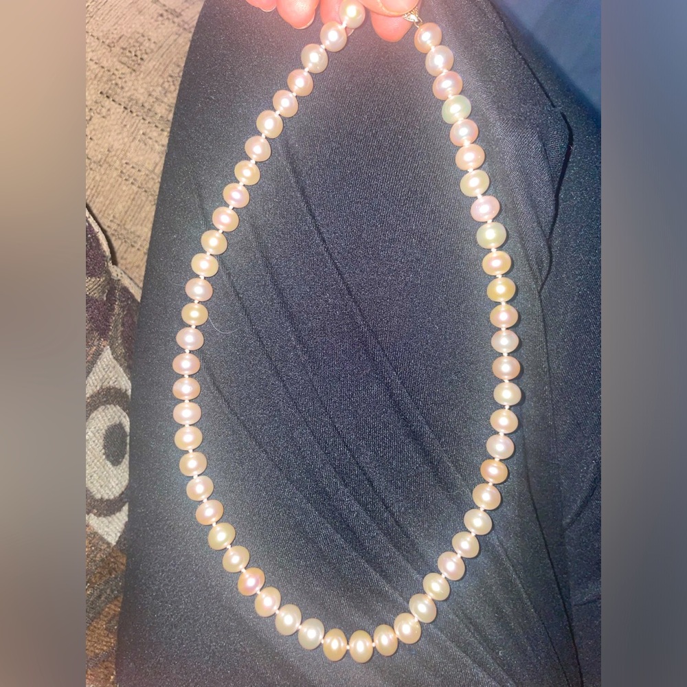 Real pink pearl necklace.